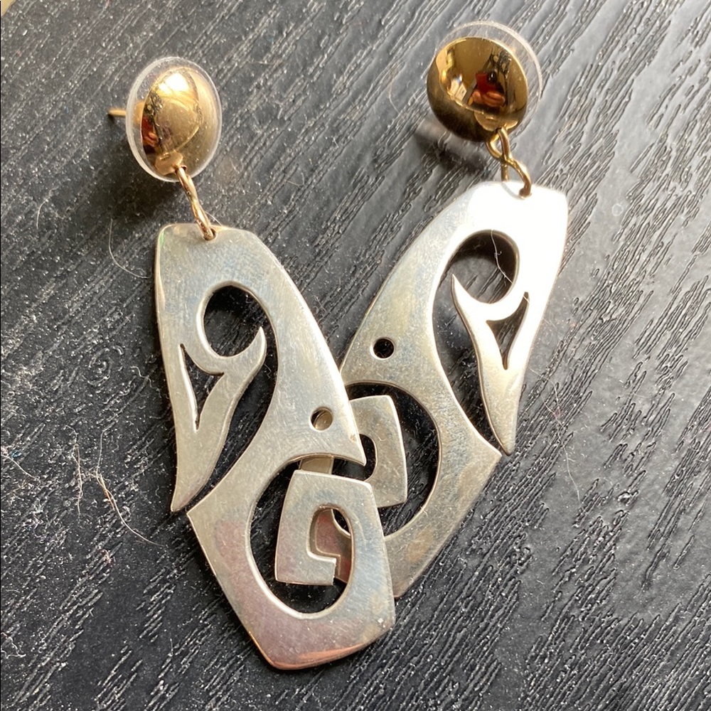 Intricate Silver Tribal Earrings with Cut-Out Design